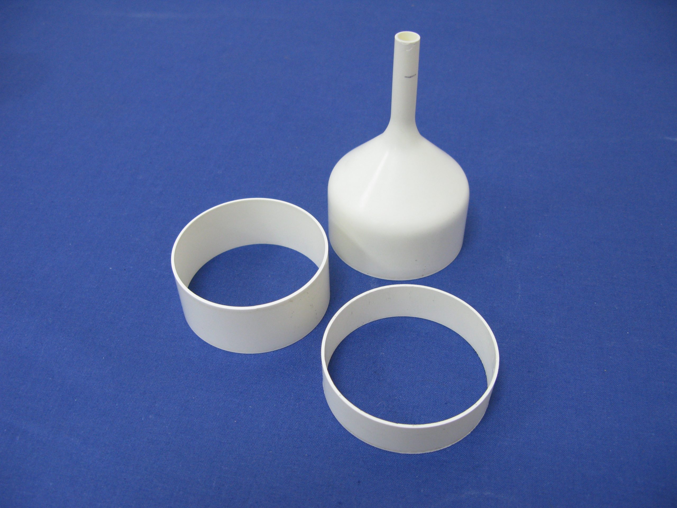 A CO2 laser cuts PBN of varying thicknesses and shapes