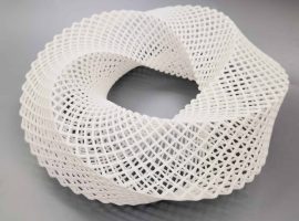 Achieve high-quality parts quicker with laser 3D printing. White 3D printed part